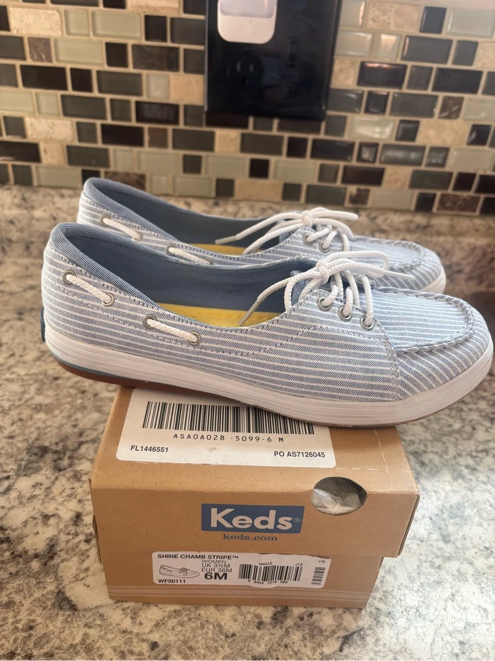 Keds lace up boat style shoe